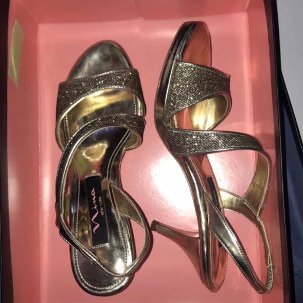 Several shoes. Sandals boots heels